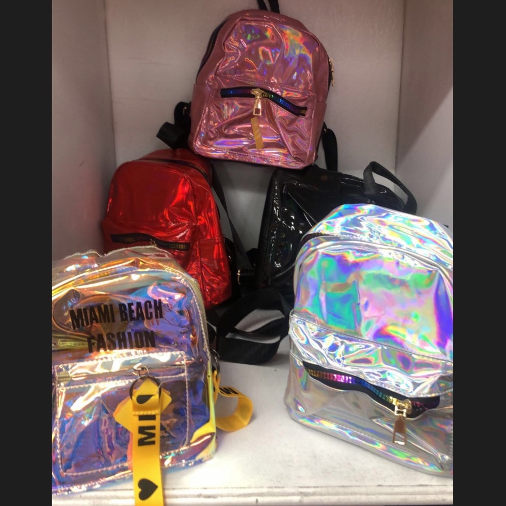 Fly girl  vinyl waterproof backpacks. 🎒